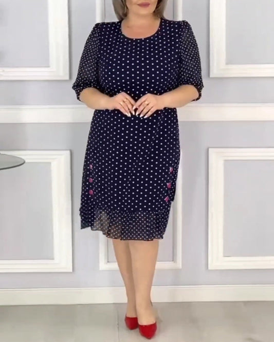 Elegant half-sleeve dress with polka dot print
